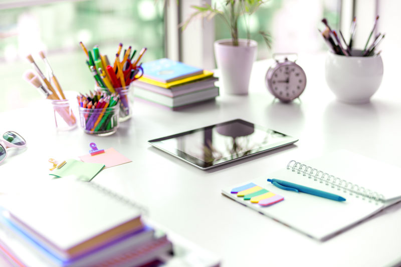 organized stationery on a desk.