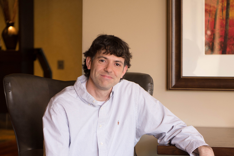 Steve sitting at a desk